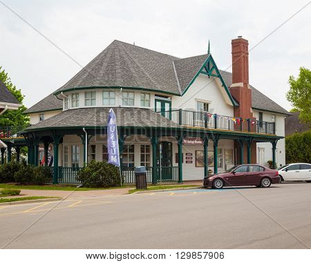 GANANOQUE CANADA - 18TH MAY 2015: The outside of the Heritage Museum in Gananoque during the day in the spring.