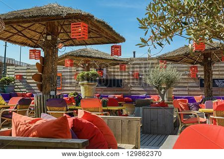 Scheveningen The Netherlands - May 13 2016: The terrace of a beachclub on the boulevard in Scheveningen.