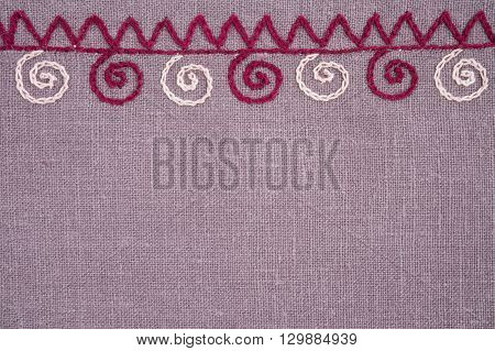 Linen napkin with hand-embroidered traditional folk ornament