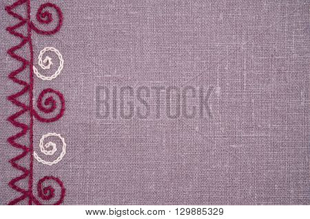 Linen napkin with hand-embroidered traditional folk ornament