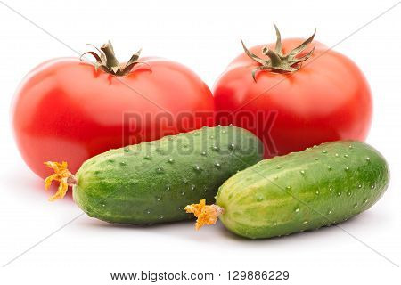 Tomatoes and cucumbers isolated on the white background with clipping path