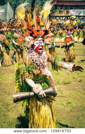 Woman With Leaves And Drum