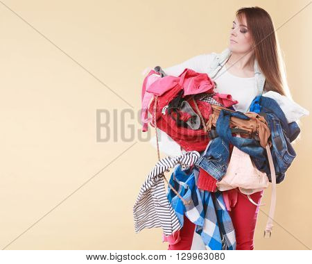Woman Carrying Dirty Laundry Clothes.