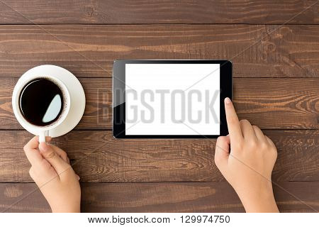 female toch on digital tablet blank screen on top view