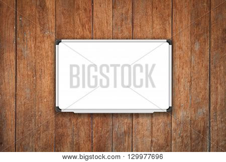 Blank white board on old wooden texture background, stock photo