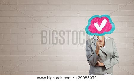 Woman applying card to face