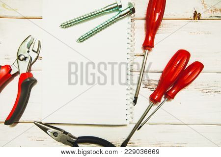 Repair Carpenter Tools: Plairs And Screwdrivers On White Old Wooden Background, Top View, Copy Space