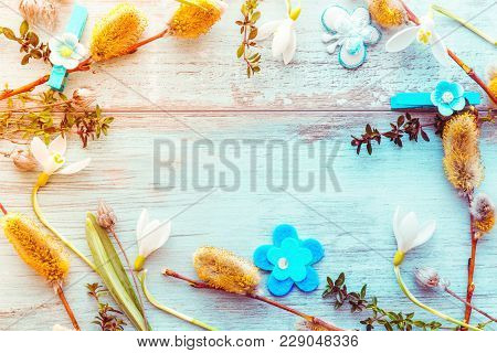 Easter Background With Easter Eggs, Pussy-willow And Spring Flowers. Top View With Copy Space