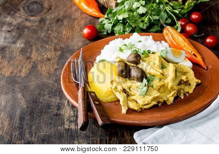 Mexican And Peruvian Cuisine. Aji De Gallina. Chicken Aji De Gallina With Olives Egg And Rice On Cla