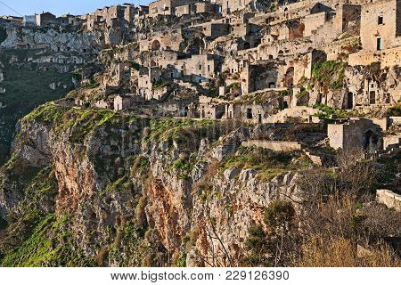 Matera, Basilicata, Italy: Landscape At Sunrise Of The Old Town Called Sassi Di Matera With The Hous