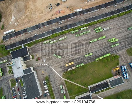 A Lot Of Green Trolley From Above. Aerial View Of Bus Deport In Kaunas, Lithuania
