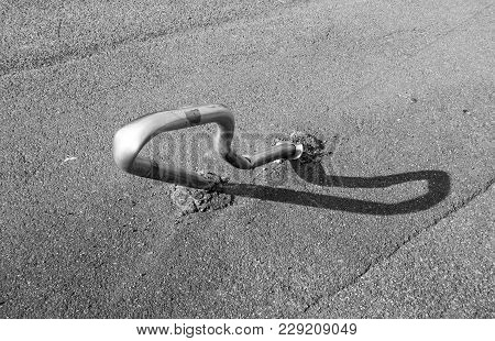 Metal Roadblock Completely Crashed And Crooked In The Street