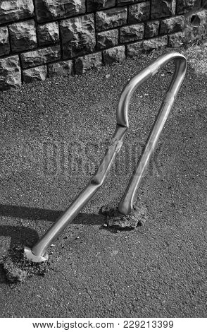 Metal Roadblock Completely Crashed And Crooked In The Street