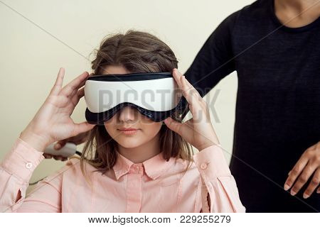 Indoor Portrait Of Relaxed And Confident Caucasian Woman On Appointment With Optometrist Sitting In 