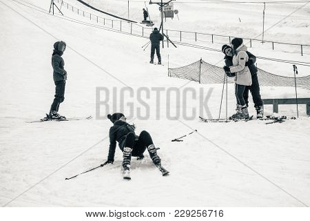 POLTAVA, UKRAINE - MARCH 02, 2018: people descend on the ski slope near Poltava