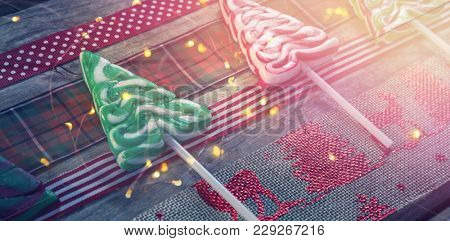 High angle view of colorful mint candies on table