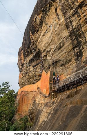 People Climb The Stairway From The Lion Platform Towards The Summit Of Sigiriya Rock Or Sinhagiri Ae