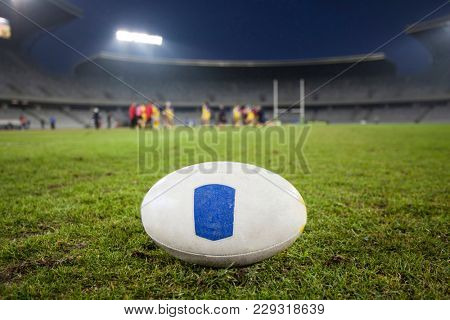 Rugby bal onl illuminated soccer stadium