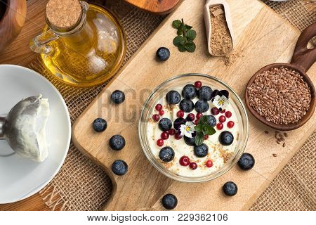 Cottage Cheese Blended With Flax Seed Oil, Topped With Fresh Blueberries, Frozen Wild Cranberries, E