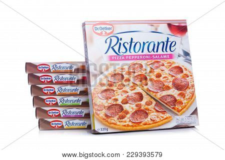 London, Uk - March 01, 2018: Boxes Of Dr.oetker Pizza Pepperoni-salame On White Background With Refl