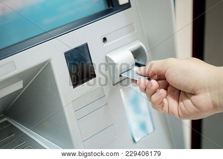 Closeup Of Automatic Teller Machine,atm Inserting A Card.