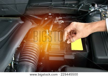 Asia Man With Engine On Blurry Background.for Automotive Or Maintenance, Service Or Transport Image.