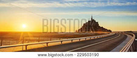 Road To Mont Saint Michel At Sunset, Normandy. France.