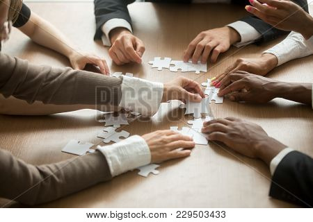 Diverse Business People Helping In Assembling Puzzle, Cooperation In Decision Making, Team Support I