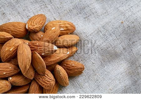 Close-up Shallow Depth Of Field Picture Of Peanut Shells Food Background, Macro. Many Peanuts In She