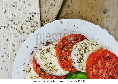 Mozzarella, Tomato, Basil And Origan - Caprese Salad Italian Food