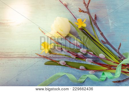 Easter Background With Easter Eggs, Pussy-willow And Spring Flowers Tulips. Top View With Copy Space