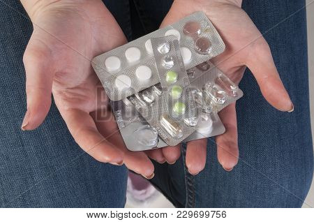Multicolor Pills In Your Palm, Medications In Woman's Hand