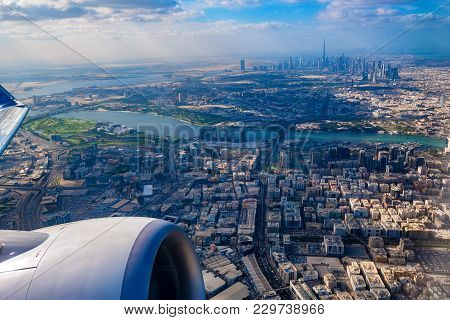 Beautiful Aerial View Of Downtown Dubai On Sunny Day Fron Airplane