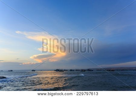 Boat Floating In The Sea For Fishing In The Sunset
