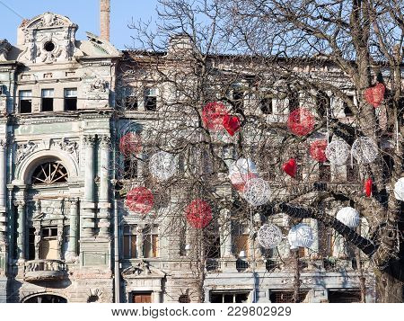 Ancient Historical Destructible Building. Old Architecture, Broken Glass Through Tree Branches With