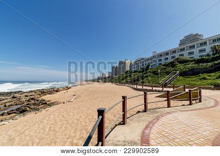 Beach  Rocks Ocean Waves Blue Coastal City Skyline