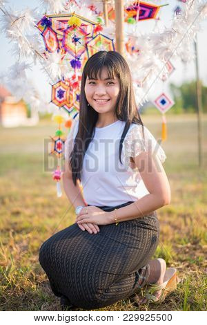 Woman Travel Around Tung Flag Festival In Phra That Ya Khu Pagoda At Kalasin,thailand