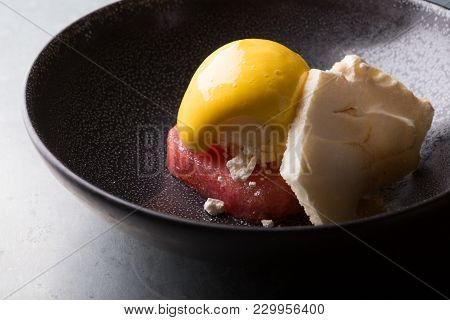 Sorbetto Ice Cream Served On A Black Bowl
