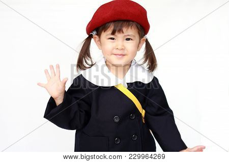 Japanese Girl In Kindergarten Uniform Waving Her Hand (3 Years Old)