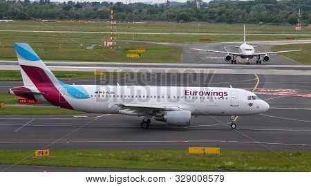 Airplane Taxi In Dusseldorf Airport