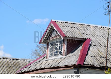 The Roof Of The House Is Made Of Slate. Old Slate On The Roof