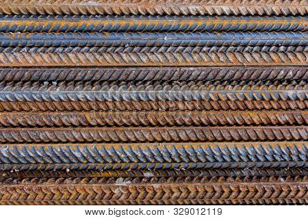 Construction Rebar With Traces Of Rust. Industrial Background. The Use Of Metal In Construction.