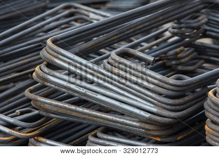 Construction Rebar With Traces Of Rust. Industrial Background. The Use Of Metal In Construction.