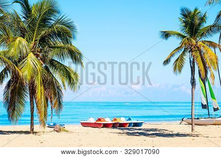 The Tropical Beach Of Varadero In Cuba With Sailboats And Palm Trees On A Summer Day With Turquoise 