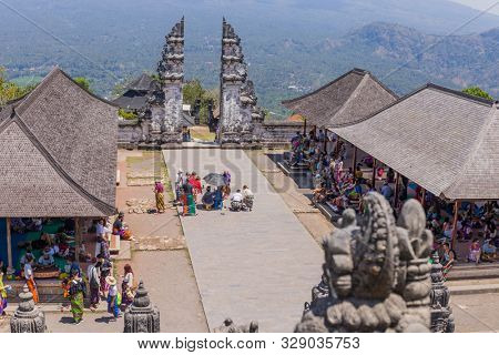BALI, INDONESIA - SEPTEMBER 17, 2019: People at the temple of Pura Penataran Agung Lempuyang. In Bali, Indonesia