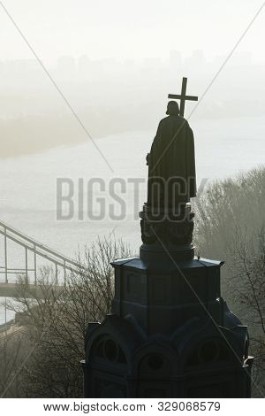 Vladimir Hill Park (Volodymyr's Hill). View of the city of Kyiv in the fog. Historical monument in the capital of Ukraine