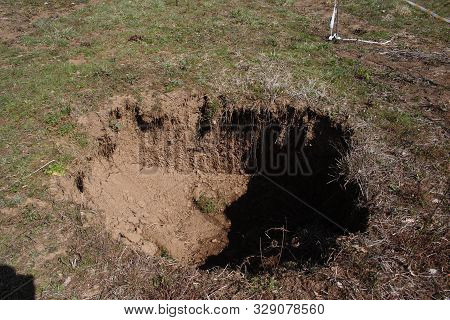 Terelle, Italy - March 15, 2009: The Small Sinkhole In The Terelle Countryside In The Province Of Fr