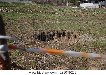 Terelle, Italy - March 15, 2009: The Small Sinkhole In The Terelle Countryside In The Province Of Fr