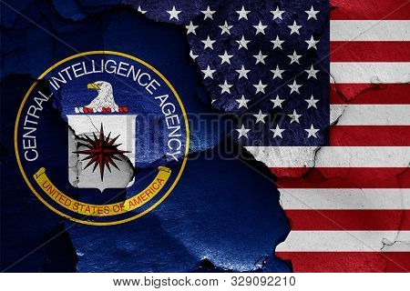 Flags Of Central Intelligence Agency And Usa Painted On Cracked Wall
