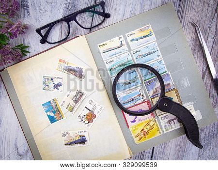 Russia, Krasnodar - September 27, 2019. A Collection Of Stamps From Different Countries. Stamps In T